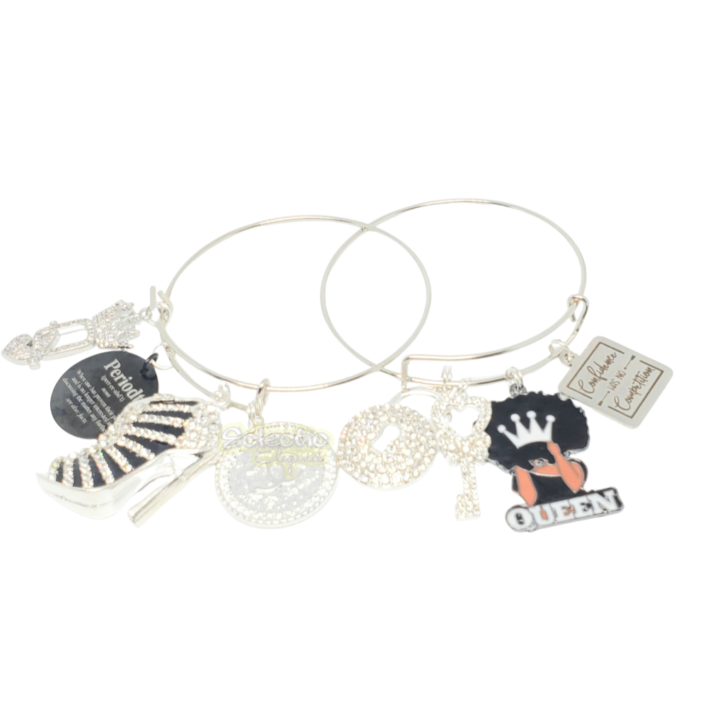2 piece bangle set in black and silver plated each bangle has 4 charms some of which have CZ crystals